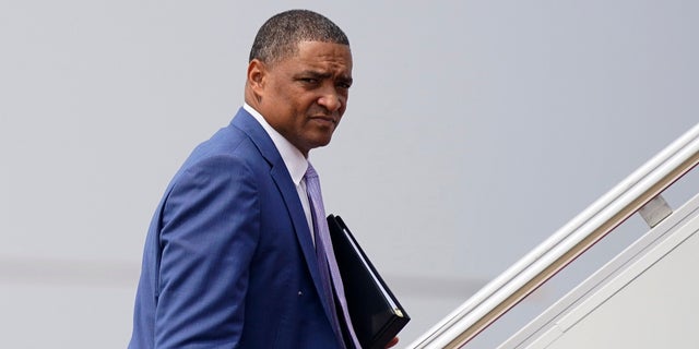 White House adviser Cedric Richmond board Air Force One at Andrews Air Force Base, Md., July 21, 2021, to travel to Cincinnati with President Joe Biden. Richmond, one of Biden's closest aides is leaving the White House to take on a role as senior adviser to the Democratic National Committee.