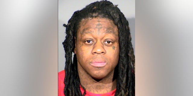 This photo provided by the Las Vegas Metropolitan Police Department shows Kevin Lamont Barnes Jr., 37, a rapper and former reality TV figure who uses the name Chopper, following his arrest Monday, April 25, 2022, in Las Vegas. Barnes was released without bail on Tuesday, April 26, 2022, pending a May 10, 2022, court appearance on a felony sex trafficking charge. Police say he used his large social media following to recruit women as prostitutes.