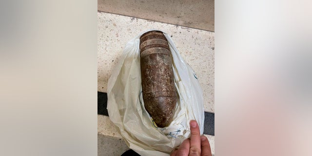 In this photo provided by Israel's airport authority, shows an unexploded artillery shell at the Ben Gurion International Airport in Lod, Israel. A bomb scare set off scenes of panic at Israel's airport after an American family showed up with an unexploded artillery shell they had found in the Golan Heights and intended to bring back as a souvenir.