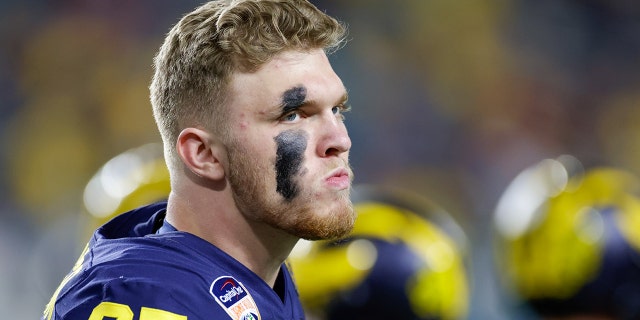 Michigan Wolverines defensive end Aidan Hutchinson (97) during the Capital One Orange Bowl game between the Georgia Bulldogs and the Michigan Wolverines on December 31, 2021 at Hard Rock Stadium in Miami Gardens, FL.