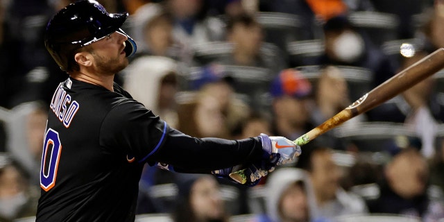 New York Mets' Pete Alonso watches a home run during the sixth inning of the team's baseball game against the Philadelphia Phillies on Friday, April 29, 2022, in New York. (AP Photo/Adam Hunger)