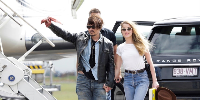 Johnny Depp and Amber Heard are pictured arriving in Australia in 2015 following the actor’s hand injury. 