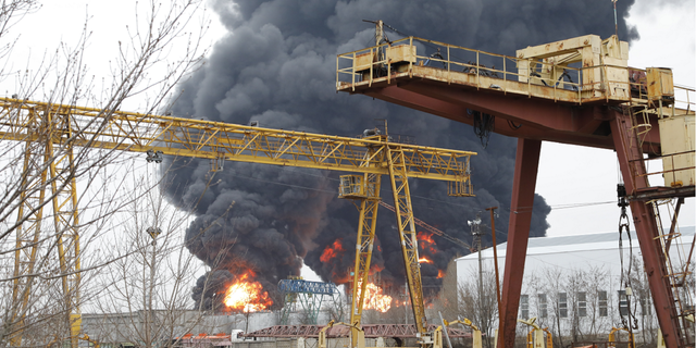 Russia accuses Ukraine of being behind the blast and fire.