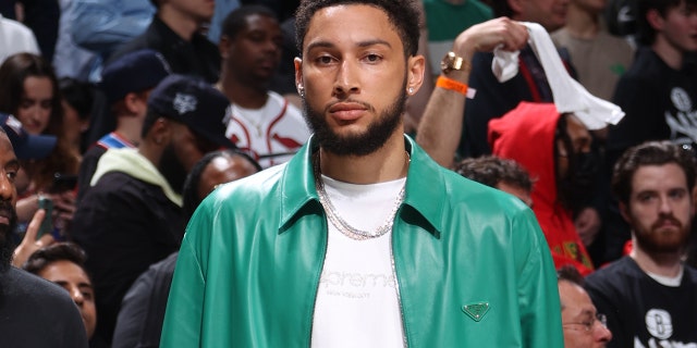 Ben Simmons of the Brooklyn Nets watches the Cleveland Cavaliers game during the 2022 Play-In Tournament on April 12, 2022, in New York.