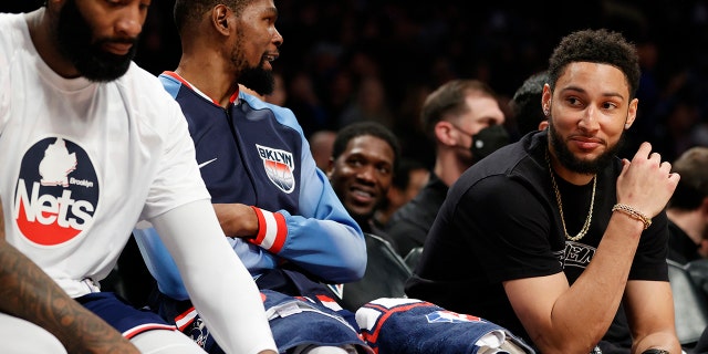 Nets' Ben Simmons watches his team take on the Indiana Pacers at Barclays Center on April 10, 2022, in Brooklyn.