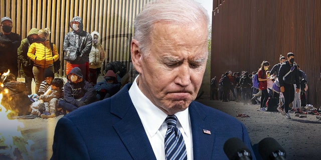  FEBRUARY 21: Asylum seekers from Colombia, Venzuela, and Cuba wait next to the USA border wall with Mexico, to be processed by CBP on February 21, 2022 in Yuma, Arizona, United States. _____ U.S. President Joe Biden speaks about reducing energy prices in the Eisenhower Executive Office Building in Washington, D.C., U.S., on Thursday, March 31, 2022.  Photographer: Al Drago/Bloomberg via Getty Images