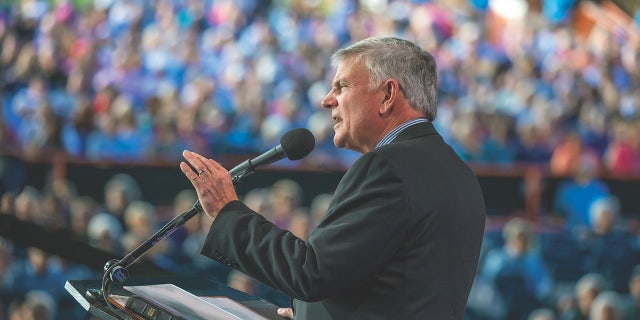 Rev. Franklin Graham delivers remarks at a faith-focused event. He has traveled twice to Ukraine amid the Ukraine-Russia war, as his organization helps Ukrainians who have lost everything. 