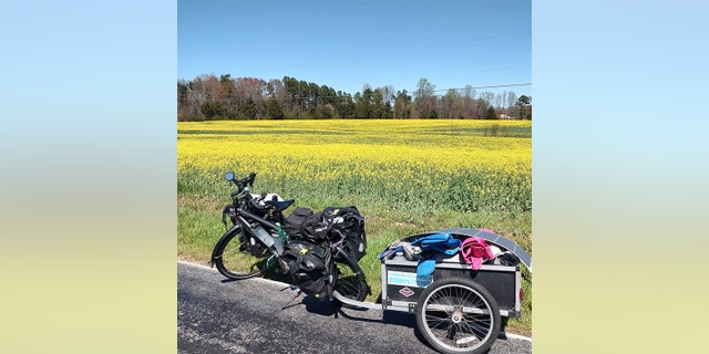  North Carolina "looked the same as it did the first time I went through," Barnes told Fox News Digital. Barnes' bicycle is pictured in front of a field in North Carolina. 