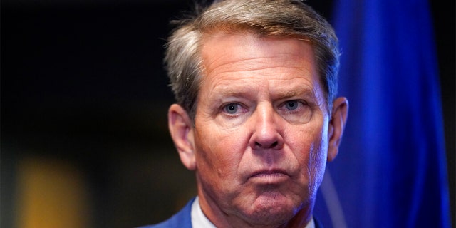 FILE: Georgia Gov. Brian Kemp speaks during a news conference, Aug. 26, 2021, in Marietta, Ga. Gov. 