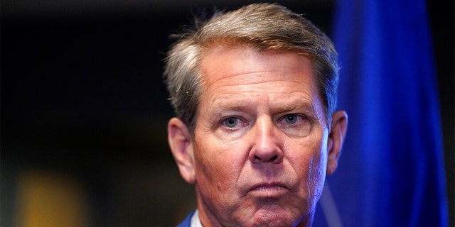 FILE: Georgia Gov. Brian Kemp speaks during a news conference, Aug. 26, 2021, in Marietta, Ga. Gov. 