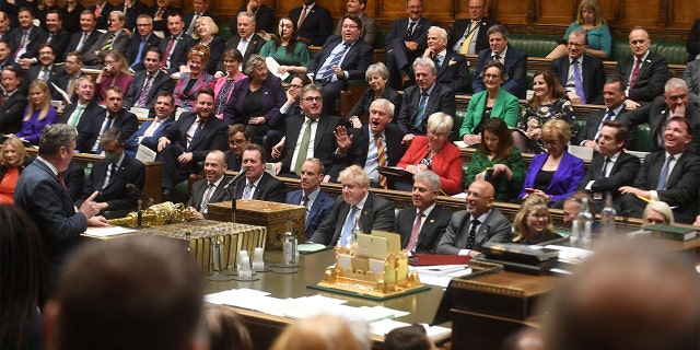 members pack the UK House of Commons