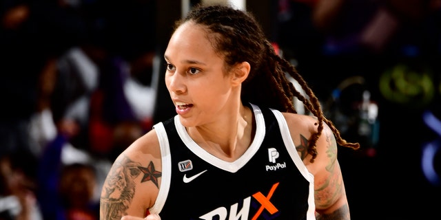 Brittney Griner of the Mercury celebrates during the WNBA Finals on Oct. 13, 2021, at the Footprint Center in Phoenix, Arizona.