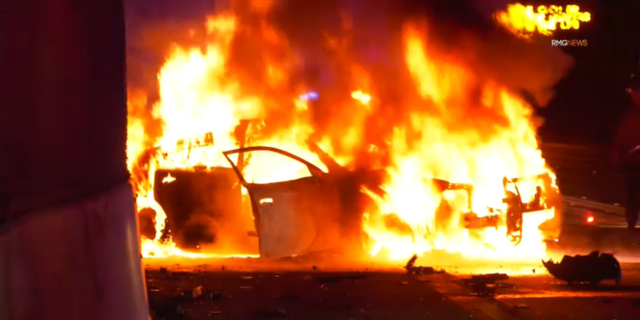 Three California Highway Patrol officers were injured when a suspected drunk driver slammed into a patrol car on a Los Angeles-area freeway, causing it to burst into flames on April 28, 2022.