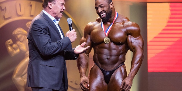 Arnold Schwarzenegger interviews Cedric McMillan after McMillan won the Arnold Classic on March 4, 2017, in Columbus, Ohio.