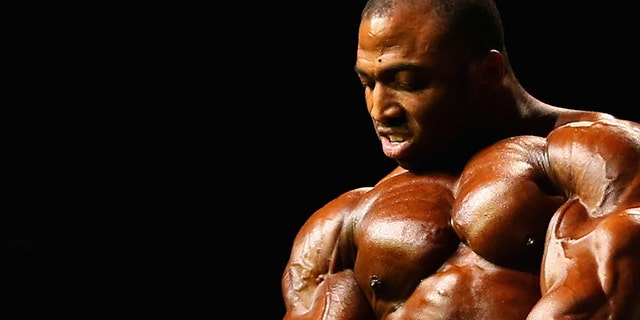 Cedric McMillan performs in the Arnold Classic Men's Bodybuilding Open on March 19, 2016, in Melbourne, Australia. 