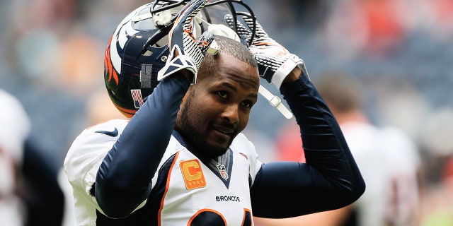 Champ Bailey #24 of the Denver Broncos waits on the field before the game against the Houston Texans at Reliant Stadium on December 22, 2013 in Houston, Texas.