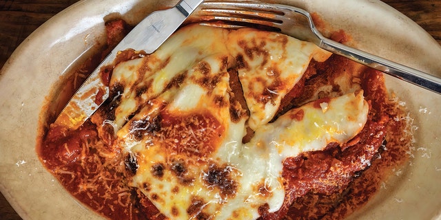 A memorable Chicken Parmesan recipe from the new book, "Food IQ," is featured here — including the recipe for its delicious red sauce.