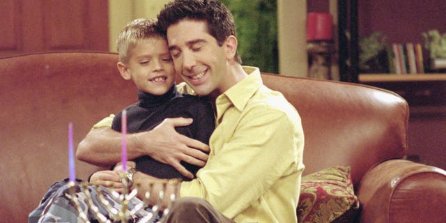 Cole Sprouse opens up about his 'complicated relationship' with celebrity culture: 'Fame is a trauma' 3 Cole Sprouse and David Schwimmer in "Friends."