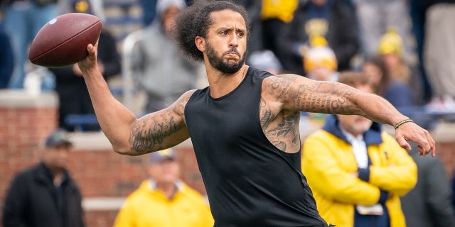 Colin Kaepernick participates in a throwing exhibition during half time of the Michigan spring football game at Michigan Stadium on April 2, 2022 in Ann Arbor, Michigan.