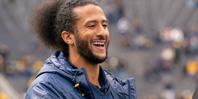 Colin Kaepernick interacts with fans before the Michigan spring football game at Michigan Stadium on April 2, 2022 in Ann Arbor, Michigan.  Kaepernick was honorary captain for the game.