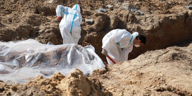 Mass graves being investigated in Ukraine.