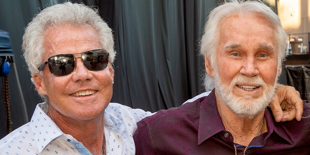 Dann Rogers (left) with his late uncle Kenny Rogers.