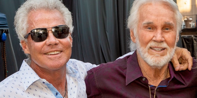 Dann Rogers (left) with his late uncle Kenny Rogers.