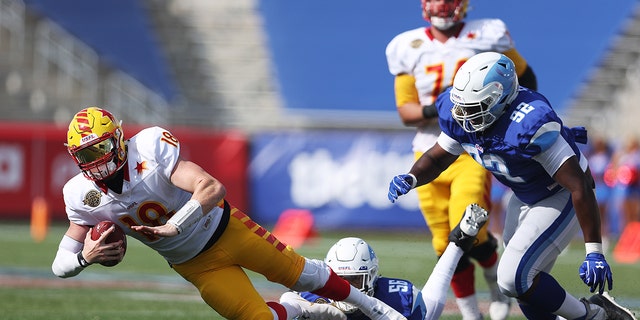 Davin Bellamy of the New Orleans Breakers tackles Bryan Scott of the Philadelphia Stars at Protective Stadium on April 17, 2022, in Birmingham, Alabama.