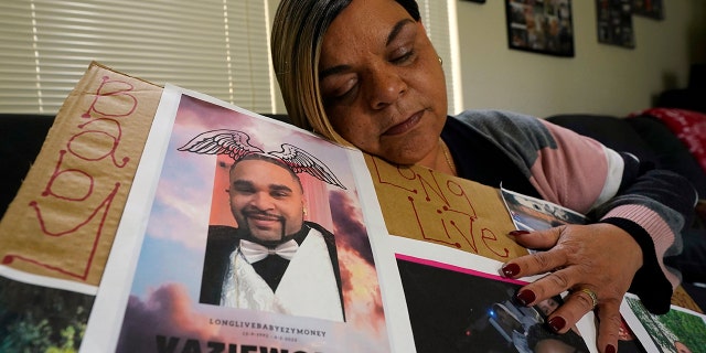 Mass shooting in Sacramento: the second suspect, the brother of the first suspect, arrested 4 Penelope Scott holds a collection of family photos including that of her son, De'vazia Turner, one of the victims killed in a mass shooting, during an interview with The Associate Press in Elk Grove, Calif., on Monday April 4, 2022. Several people were killed and injured in the shooting a day earlier.