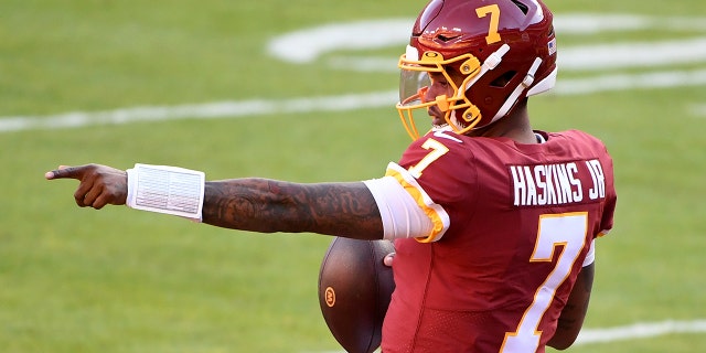 Dwayne Haskins Jr. # 7 of the Washington Football Team warms up prior to the game against the Carolina nthers at FedExField on Dec. 27, 2020 in Landover, Maryland.