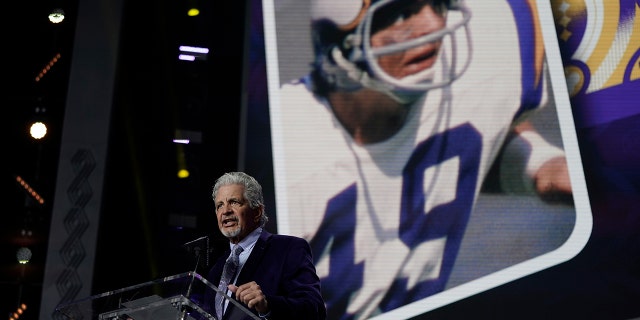 Actor Ed Marinaro announces Clemson cornerback Andrew Booth Jr. as a Minnesota Vikings selection during the second round of the NFL football draft Friday, April 29, 2022, in Las Vegas.
