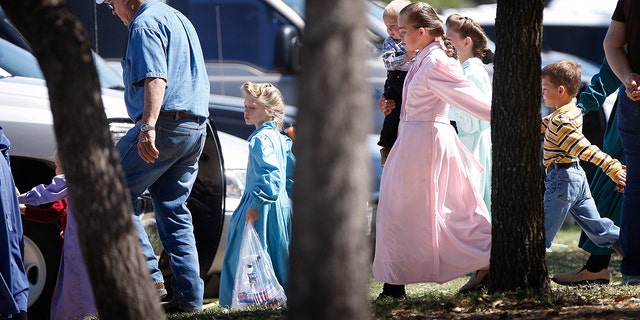 Women and children from the YFZ ranch, the compound built by polygamist leader Warren Jeffs, are moved by bus to San Angelo, Texas, on Sunday, April 6, 2008.