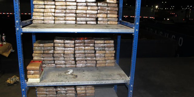 CBP officers discovered 101 packages containing 427 pounds of cocaine at a border crossing site in Laredo. (U.S. Customs and Border Protection)