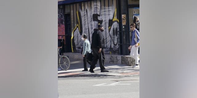 In this image obtained by Fox News, Frank James is spotted walking on Wednesday, April 13 in Manhattan.