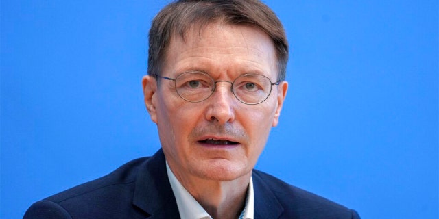FILE: German Health Minister Karl Lauterbach addressing the media during a press conference in Berlin, Germany, Friday, Feb. 25, 2022.