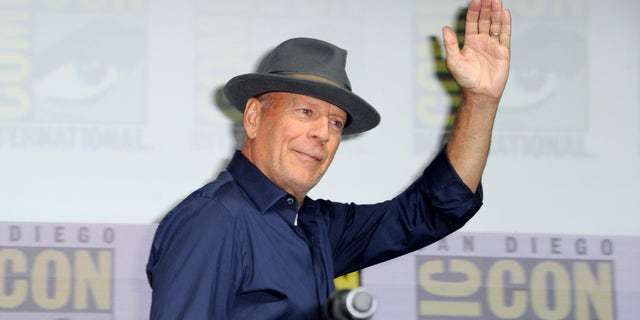 Bruce Willis walks onstage at Universal Pictures' "Glass" and "Halloween" panels during Comic-Con International 2018 at San Diego Convention Center on July 20, 2018 in San Diego, California.