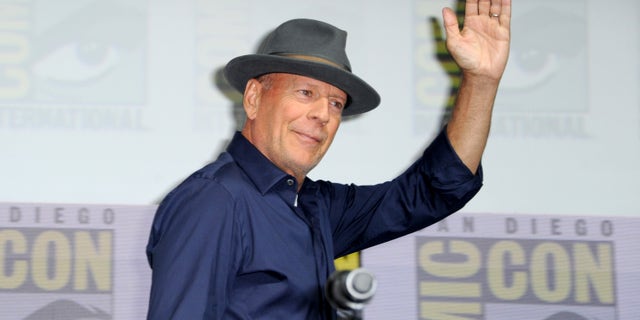 Bruce Willis walks onstage at Universal Pictures' "Glass" and "Halloween" panels during Comic-Con International 2018 at San Diego Convention Center on July 20, 2018 in San Diego, California.