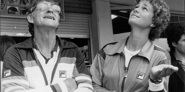 NSW Women's Tennis Open at White City Semifinals.Pam Shriver (R) and her coach Don Candy (L) hoping for rain to hold off till after her match. December 5, 1980. 