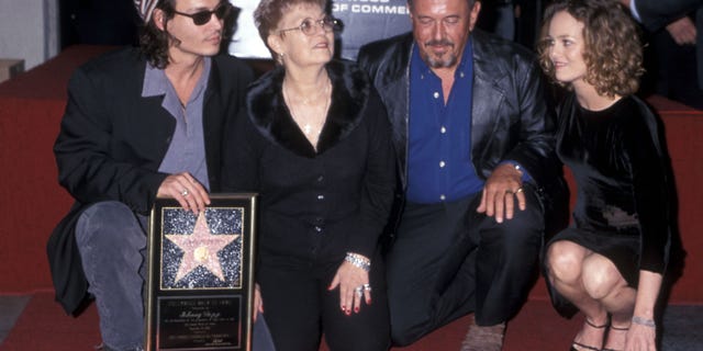 Actor Johnny Depp, mother Betty Sue Wells, father John Depp and girlfriend Vanessa Paradis in 1999. While on the stand, Depp recalled his life as an adolescent.