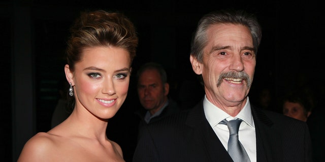 Of her upbringing, Heard told Vanity Fair in 2014: "My dad is your typical old school Texan." Amber Heard is pictured here with her father, David Heard.