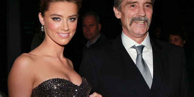Of her upbringing, Heard told Vanity Fair in 2014: "My dad is your typical old school Texan." Amber Heard is pictured here with her father, David Heard.