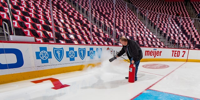 Al Sobotka Zamboni driver and building operations manager for Olympia Entertainment works on the #7 logo he embedded in the ice in honor of the late Detroit Red Wing and Hall of Fame great Ted Lindsay at Little Caesars Arena on March 7, 2019 in Detroit, Michigan.