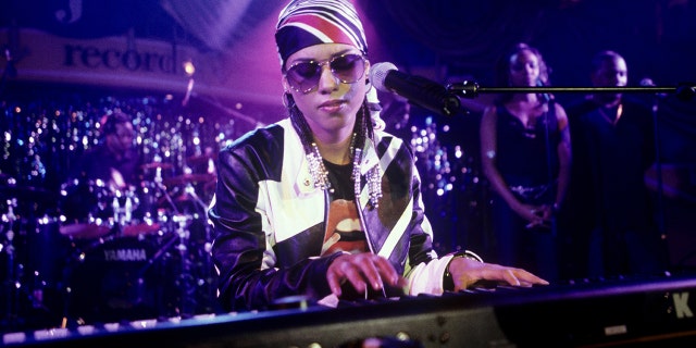 Alicia Keys is shown on tour in Munich, Germany, on Sept. 7, 2001. (Photo by Fryderyk Gabowicz/picture alliance via Getty Images)