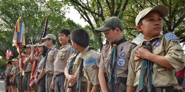 Boy Scouts from Troop 55, of Falls Church Va., prepare for the approaching the National Independence Day Parade on Constitution Avenue in Washington D.C. on July 4, 2019.