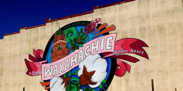 A mural promoting the city on a building in downtown Waxahachie, Texas.