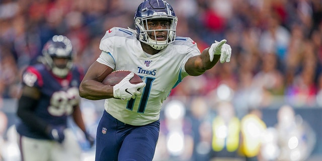 HOUSTON, TX - DECEMBER 29: Tennessee Titans wide receiver AJ Brown (11) points to a defender during the game between the Tennessee Titans and the Houston Texans on December 29, 2019 at NRG Stadium in Houston, TX.