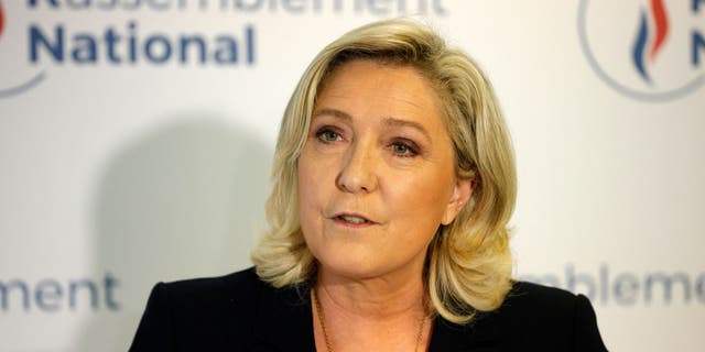 French far-right Rassemblement National (RN) party leader and member of parliament Marine Le Pen speaks to the press at the party's headquarters after the first results in the second round of the French regional elections in Nanterre June 27, 2021.