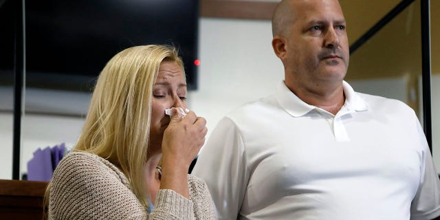 Tara Petito and Joe Petito react while City of North Port Chief of Police Todd Garrison speaks during a news conference about their missing daughter Gabby Petito Sept. 16, 2021, in North Port, Fla.