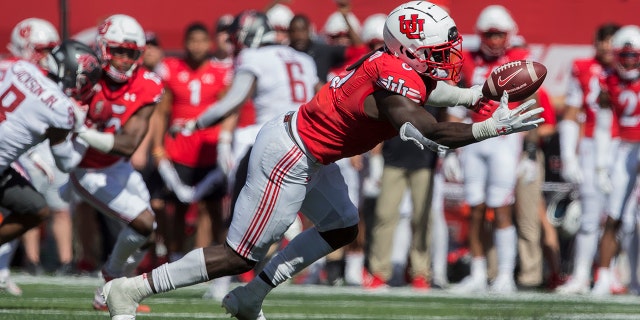 Devin Lloyd (0) of the Utah Utes catches the ball for an interception against the Washington State Cougars during a game Sept. 25, 2021, at Rice Eccles Stadium in Salt Lake City, Utah.