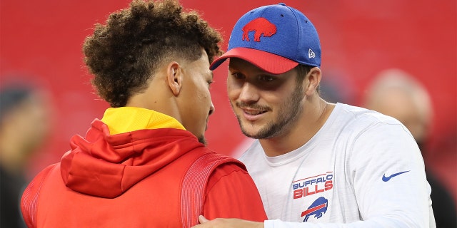 Buffalo Bills quarterback Josh Allen (17) and Kansas City Chiefs quarterback Patrick Mahomes (15) hug before an NFL football game between the Buffalo Bills and Kansas City Chiefs on Oct. 10, 2021 at GEHA Filed at Arrowhead Stadium in Kansas City, MO.